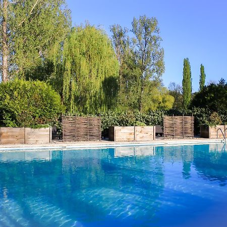 Les Trois Soleils Hotel Saint Cere Bagian luar foto